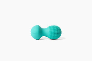 Neuro Roller | RAD wellness device in turquoise with textured surface designed for targeted muscle recovery and body care massage therapy.