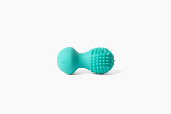 Neuro Roller | RAD wellness device in turquoise with textured surface designed for targeted muscle recovery and body care massage therapy.
