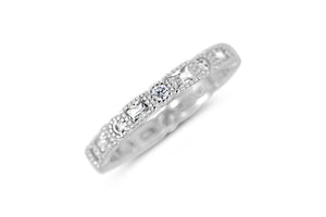 Serene Beauty Ring | Little Sparkles featuring a delicate silver band adorned with small, sparkling diamonds arranged in an elegant design for a refined look.