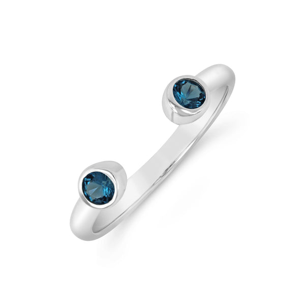 Jelly Tots Ring | Little Sparkles featuring an open silver band with two bezel-set deep blue gemstones, designed for a modern and elegant look.