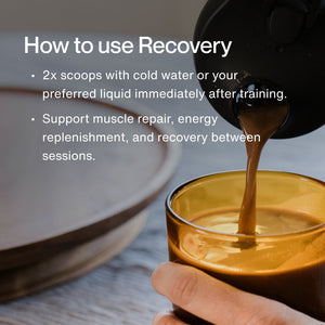 Hand pouring a liquid into a glass with text explaining how to use Recovery by mixing two scoops with cold water or preferred liquid after training to support muscle repair and energy replenishment.