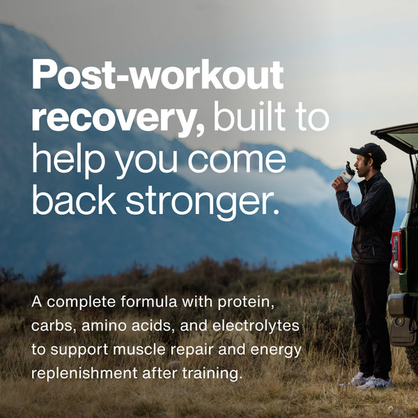 Man standing outdoors by a vehicle drinking a recovery supplement with text describing post-workout recovery as a formula with protein, carbs, amino acids, and electrolytes to support muscle repair and energy replenishment after training.
