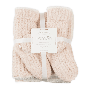 3pc Women's Sherpa Lined Cozy Waffle Set | Lemon featuring a soft sherpa-lined waffle knit blanket, matching socks, and an eye mask in a light beige color for ultimate comfort and warmth.
