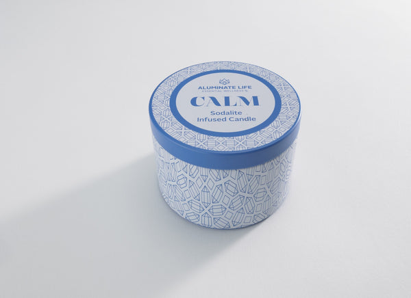 Calm Candle Tin 6 oz | Aluminate Life featuring a blue and white patterned container with a secure lid, designed for creating a soothing and relaxing atmosphere.