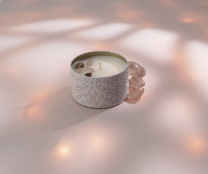 Defense Candle Tin 6 oz | Aluminate Life in a patterned ceramic tin with decorative stones, styled in soft natural light for a calming wellness ambiance.