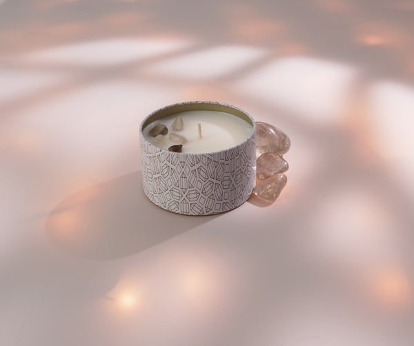 Defense Candle Tin 6 oz | Aluminate Life in a patterned ceramic tin with decorative stones, styled in soft natural light for a calming wellness ambiance.