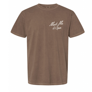 Meet Me At The Spa Retro Unisex T-Shirt | Lucky Owl in a soft brown color with a minimalist vintage-inspired spa-themed design on the chest for casual wellness and body care style.