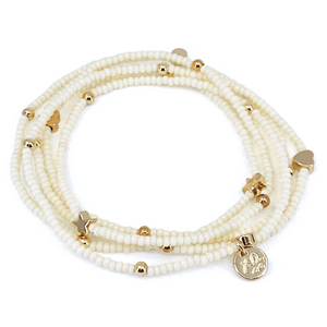 Wonder Wrap Bracelet (White Pearl & Gold Multi) | Love You More featuring delicate white pearl beads and gold accents including hearts, stars, and a charm with an elegant design.