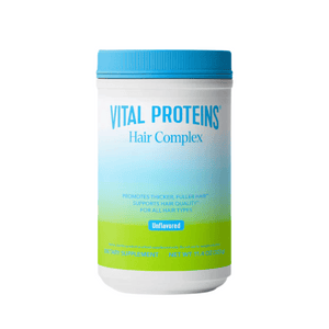 Container of Hair Complex - Unflavored | Vital Proteins dietary supplement with blue lid and white and green label promoting thicker, fuller hair and supporting hair quality.