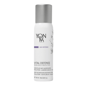 White bottle with silver cap labeled Vital Defense Mist | Yon-Ka Paris, an anti-aggression radiance care mist for skincare, designed to protect against pollution and light.