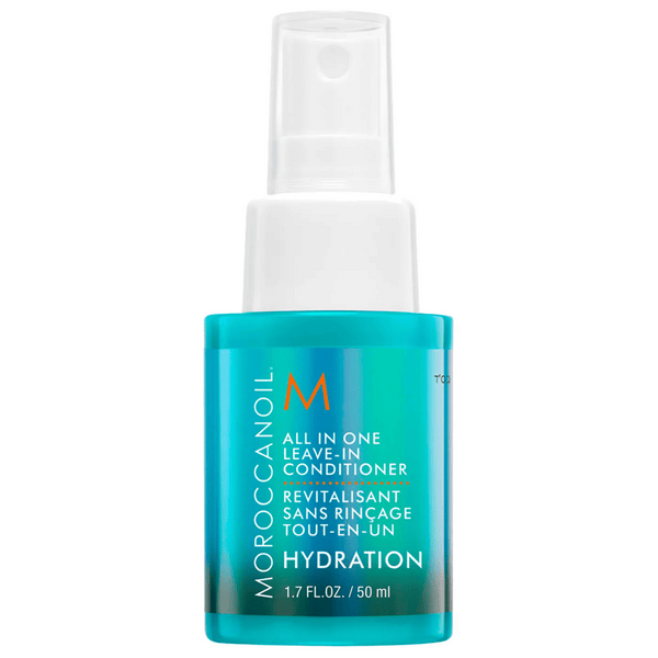 Bottle of All in One Leave-In Conditioner - Travel | Moroccanoil in turquoise packaging designed for hydration and easy hair care on the go.