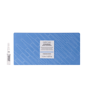 Blue box packaging and single clear ampoule of Hydramemory Hydra & Glow Ampoules | [ comfort zone ] skincare product designed for hydration and illumination in wellness and body care routines.