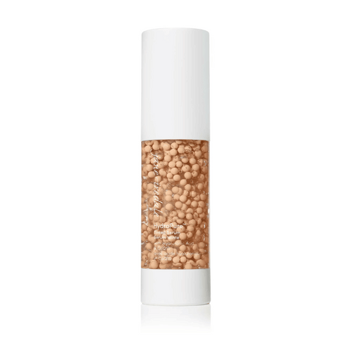 HydroPure™ Tinted Serum with Hyaluronic Acid & CoQ10 | Jane Iredale in a clear bottle showing beige serum beads inside, designed for skincare and hydration.