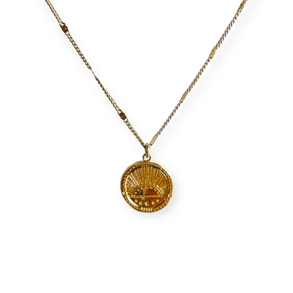 Golden Sunrise Necklace | Meghan Bo featuring a delicate gold chain and round pendant with a sun rising design, symbolizing warmth and new beginnings.