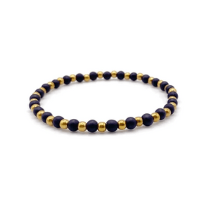 Vivid Bracelet | Purpose Jewelry featuring alternating black and gold round beads, designed to complement wellness and stylish everyday wear.