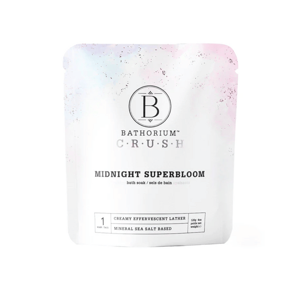 Packaging of Midnight Superbloom Crush | Bathorium, a mineral sea salt-based bath soak designed for creamy effervescent lather and wellness care.