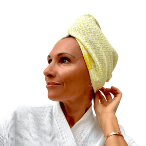Woman wearing a yellow Microfiber Hair Turban | Popmask wrapped around her head, styled for skincare or post-shower wellness routine.