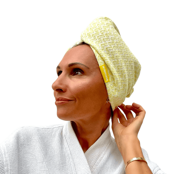 Woman wearing a yellow Microfiber Hair Turban | Popmask wrapped around her head, styled for skincare or post-shower wellness routine.