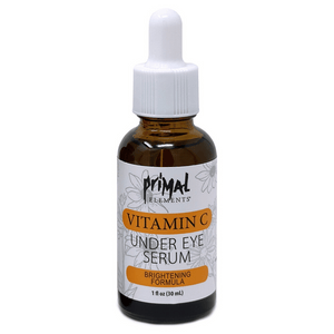 Bottle of Vitamin C Under Eye Serum | Primal Elements with dropper cap, designed for skincare and brightening under-eye areas.