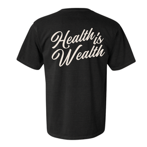 Black t-shirt with the phrase "Health is Wealth" written in elegant cream-colored script on the back, showcasing the Health Is Wealth T-Shirt | Lucky Owl design.