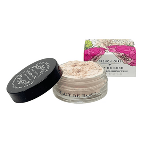Vitamin C Polishing Facial Wash & Mask | French Girl shown in an open glass jar with powdery pink cleanser beside floral packaging, highlighting skincare and wellness.