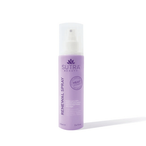 A lavender-colored spray bottle of Heat Guard Renewal Spray | SUTRA with a clear cap, designed for skincare and body care protection.