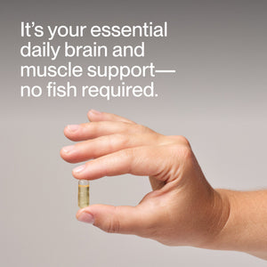 Vegan Omega-3 wellness supplement capsule held between fingers with messaging about daily brain and muscle support and no fish required