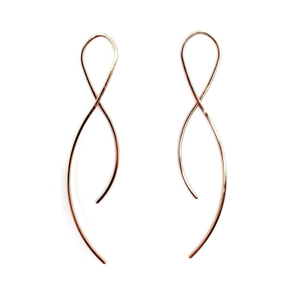 Delicate, slender gold-tone earrings with a graceful, abstract looped design, showcasing elegance and simplicity in the Vista Earrings | Purpose Jewelry collection.