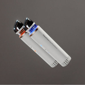 Two sleek skincare devices with glowing lights, labeled TheraFace Depuffing Wand | Therabody, designed for facial wellness and body care treatments.