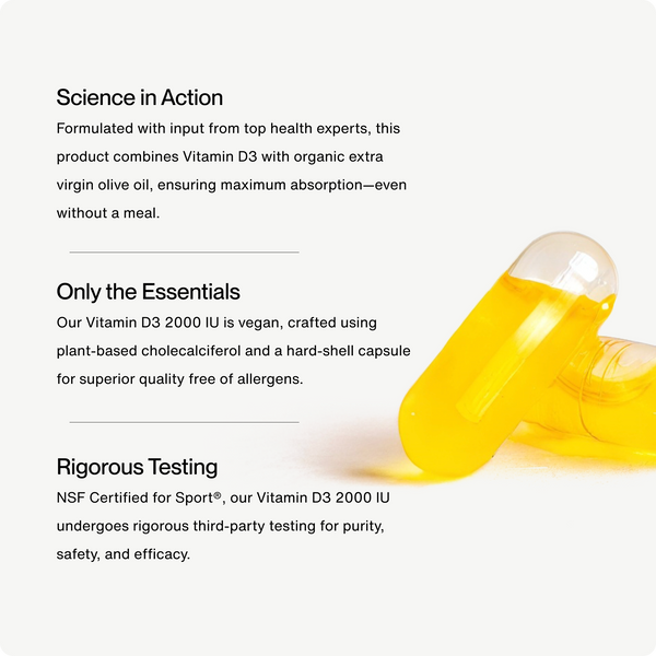 Close-up view of two translucent golden capsules representing Vitamin D3 2000 IU, emphasizing purity, plant-based ingredients, and rigorous third-party testing for wellness supplements.