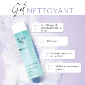 Bottle of Gel Nettoyant Cleanser | Yon-Ka Paris lying on a surface with foamy cleanser around it, highlighting its gentle, soothing, hydrating, and purifying skincare benefits.