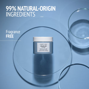 Close-up of a skincare cream jar inside a transparent glass dish on a blue surface, highlighting 99% natural-origin ingredients and fragrance-free with the product title Kit French Garden | [ comfort zone ].