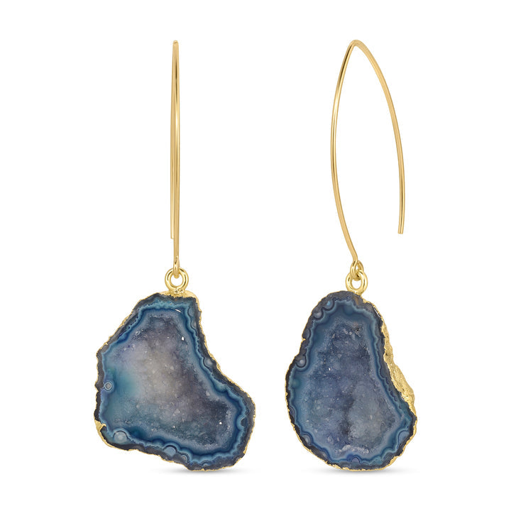 Pair of elegant Blue Geode Earrings | Meghan Bo with deep blue natural geode stones framed in gold, featuring delicate elongated gold hooks for a stylish, bohemian look.