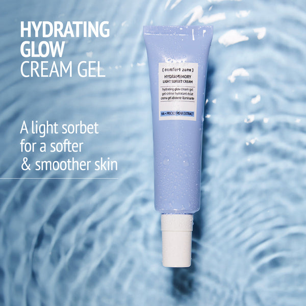 Hydrating glow cream gel in pastel purple tube on reflective water surface, promoting softer and smoother skin with Exotic Garden Kit | [ comfort zone ] branding.
