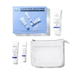 CLEAR SKIN SOLUTIONS Blemish Defense Trio | IMAGE Skincare set including three skincare tubes and a white mesh cosmetic bag for clear skin treatment and blemish defense.