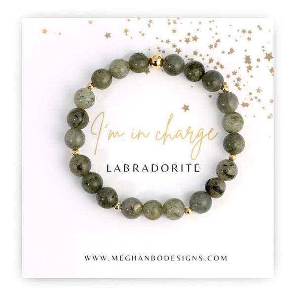 Creativity Intention Bracelet | Meghan Bo featuring natural labradorite beads with small gold accents displayed on a card with the phrase "I'm in charge" and scattered gold star confetti.