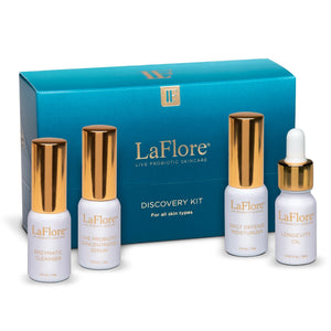 Discovery Kit | LaFlore featuring four skincare products with white bottles and gold caps, designed for all skin types to enhance wellness and probiotic skincare.