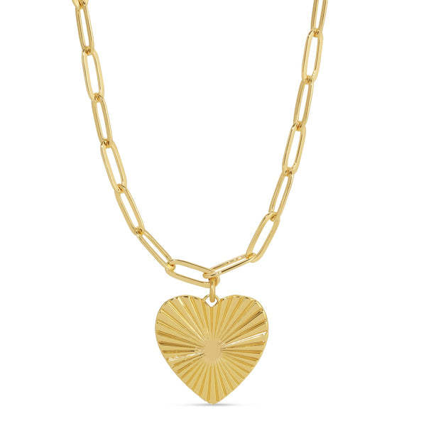 Gold chain necklace featuring a textured heart pendant with a radiant design, styled as the Full Heart Necklace | Meghan Bo.