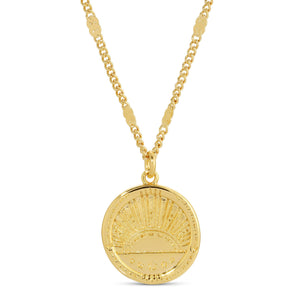 Golden Sunrise Necklace | Meghan Bo featuring a gold pendant with an engraved sunrise design on a matching chain, embodying elegant and timeless style.
