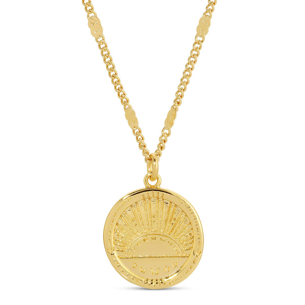 Golden Sunrise Necklace | Meghan Bo featuring a gold pendant with an engraved sunrise design on a matching chain, embodying elegant and timeless style.