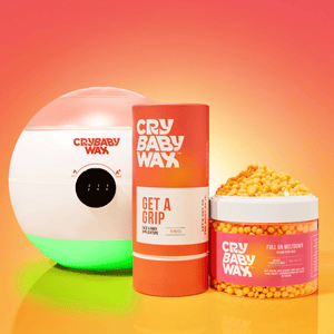 Get a Grip Face & Body Applicators | Crybaby Wax displayed alongside a wax warmer and a jar of yellow wax beads, highlighting skincare and body care essentials.