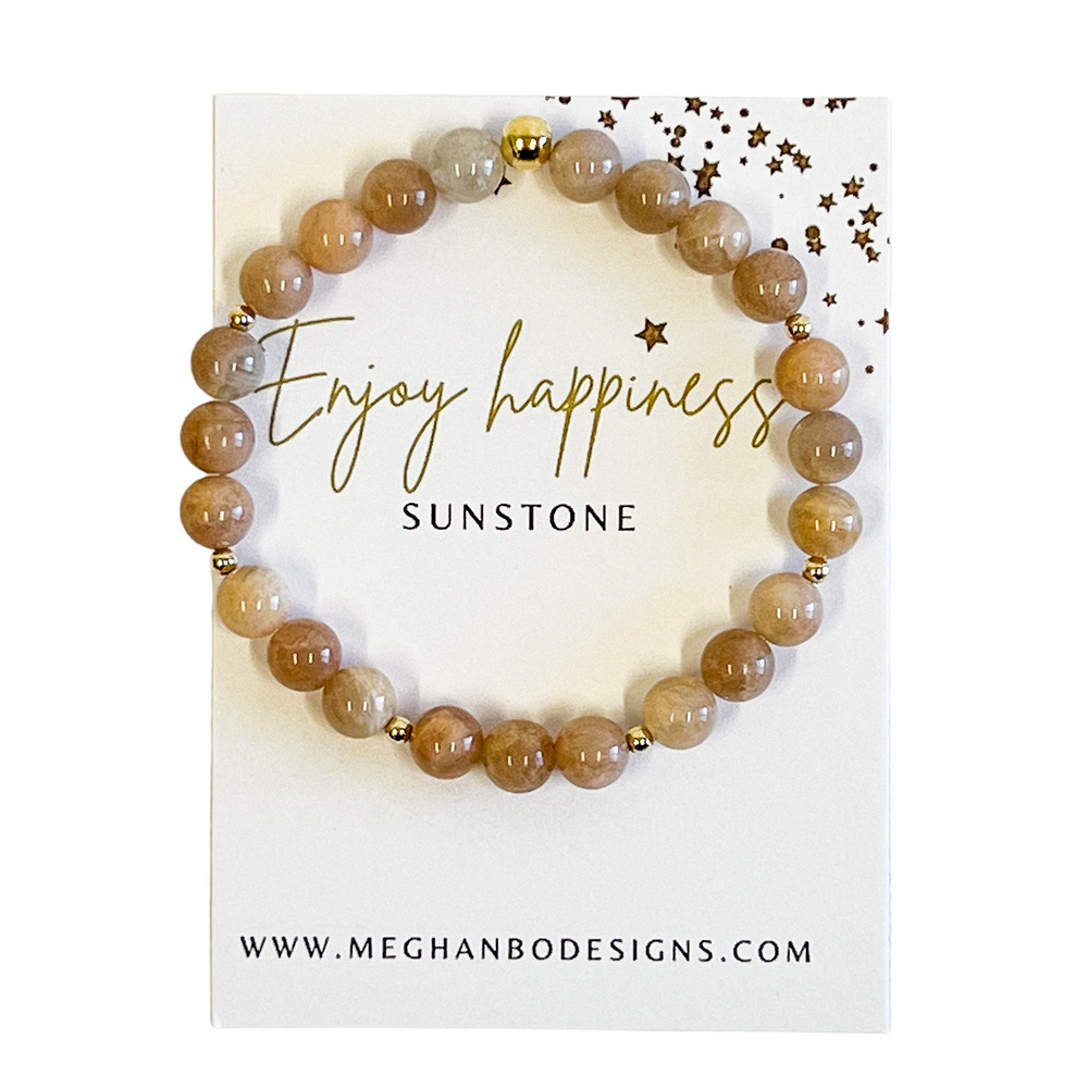 Joy Intention Bracelet | Meghan Bo featuring round peach-colored beads with gold accents, designed to promote wellness and positive energy.
