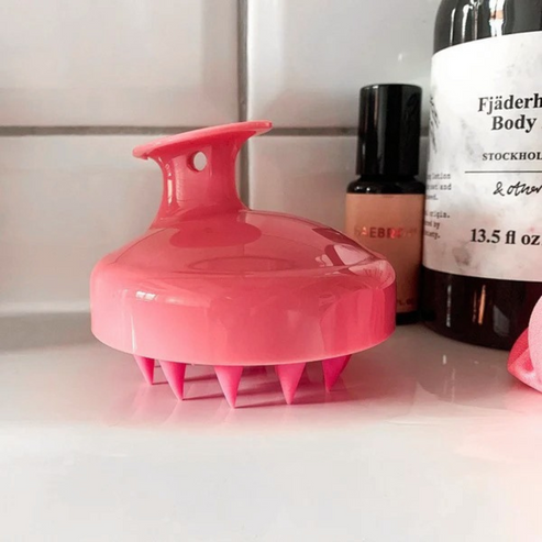 Pink silicone scalp scrubber with soft bristles designed for cleansing and massage, part of the Scalp Scrubber [Revitalizing Scalp Massager] | Dreambox Beauty collection.