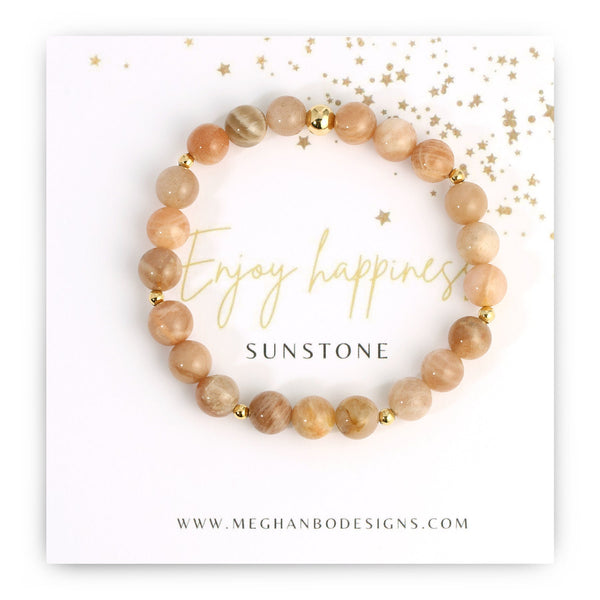 Joy Intention Bracelet | Meghan Bo featuring polished sunstone beads with gold accents displayed on a card with an uplifting message for wellness and joy.