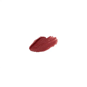 Smudge of deep rose-colored lip tint on white background showcasing the rich, creamy texture of Le Lip Tint | French Girl.