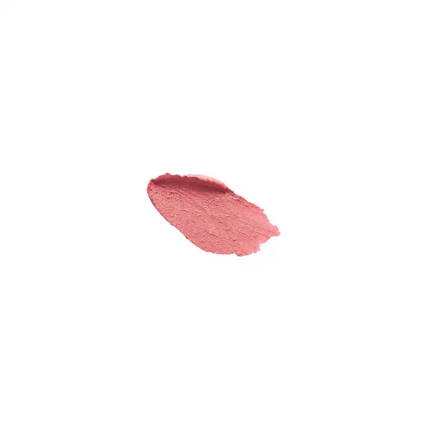 Smudge of soft pink lip tint makeup on white background showcasing the shade and texture of Le Lip Tint | French Girl.