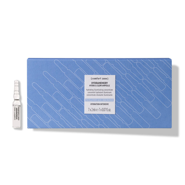 Box of Hydramemory Hydra & Glow Ampoules | [ comfort zone ] skincare product with one clear ampoule beside it on a white background, highlighting hydration and glow benefits.