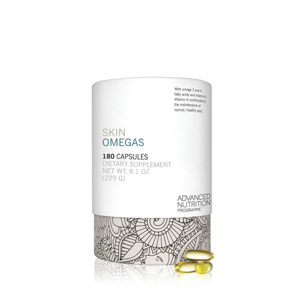 Minimalist white container of Skin Omegas Supplement | Jane Iredale with botanical pattern near base and three golden capsules displayed in front on white background
