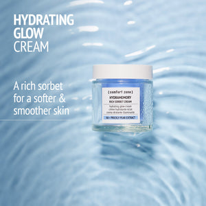 Jar of hydrating glow cream with prickly pear extract immersed in water ripples, promoting softer and smoother skin with Kit Night Garden | [ comfort zone ] skincare product.