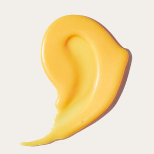 Swatch of bright yellow Full On Meltdown Vegan Hard Wax | Crybaby Wax on a light background, showcasing its smooth texture for skincare and body care use.